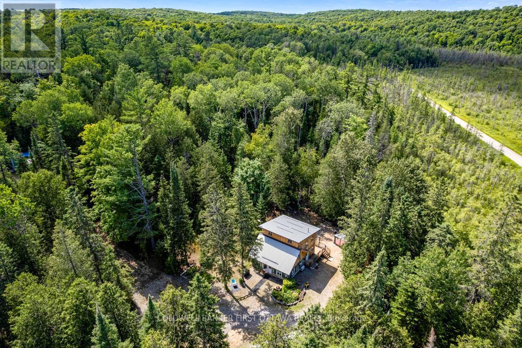 1169 Mosque Lake Road, Frontenac (Frontenac North), ON - Outdoor With Body Of Water With View