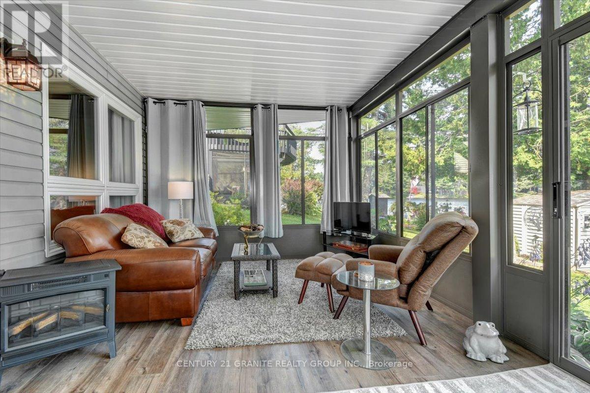 183 Fell Road, Hastings Highlands (Herschel Ward), ON - Indoor Photo Showing Living Room With Fireplace