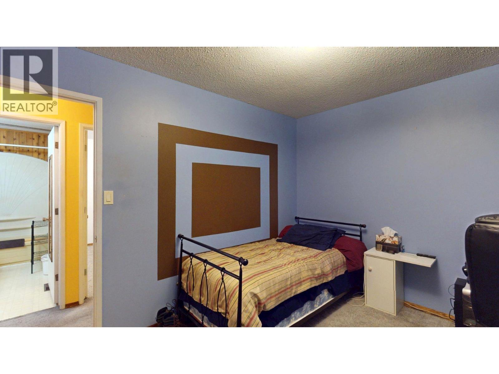 2016 Alder Street, Elkford, BC - Indoor Photo Showing Bedroom