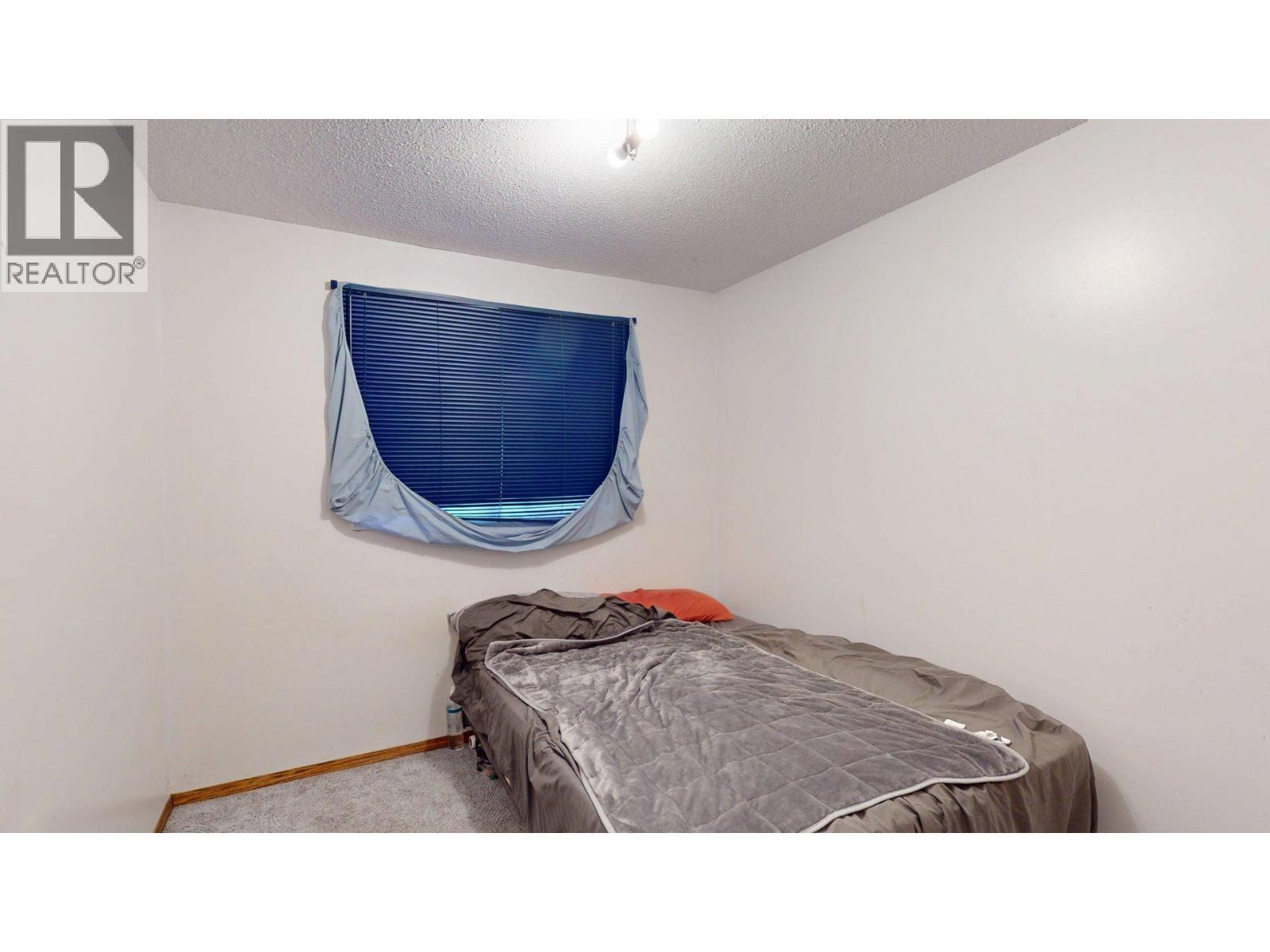 2016 Alder Street, Elkford, BC - Indoor Photo Showing Bedroom