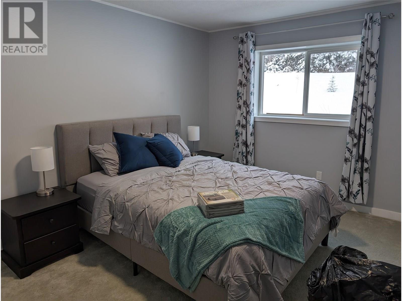 52 Sukunka Place, Tumbler Ridge, BC - Indoor Photo Showing Bedroom