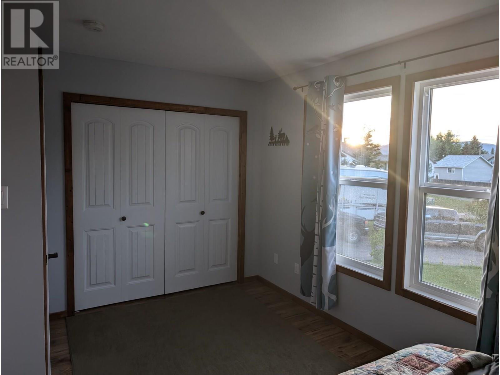 56 Sukunka Place, Tumbler Ridge, BC - Indoor Photo Showing Bedroom