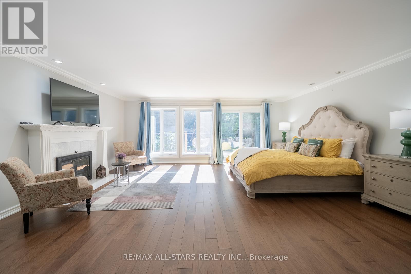 64 Woodbridge Circle, Scugog, ON - Indoor Photo Showing Bedroom With Fireplace