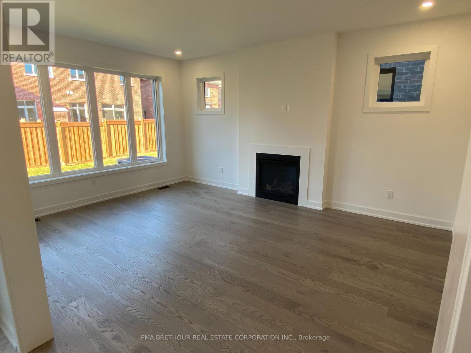 35 Brabin Circle, Whitby, ON - Indoor With Fireplace