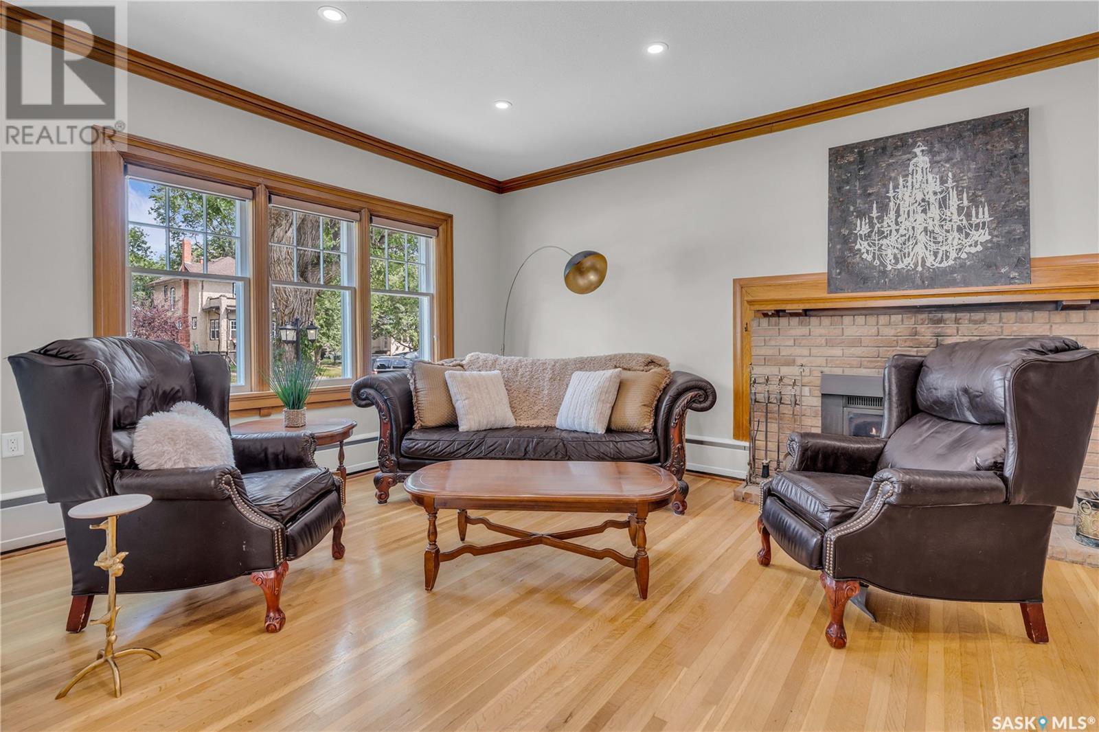 3120 Rae Street, Regina, SK - Indoor Photo Showing Living Room With Fireplace