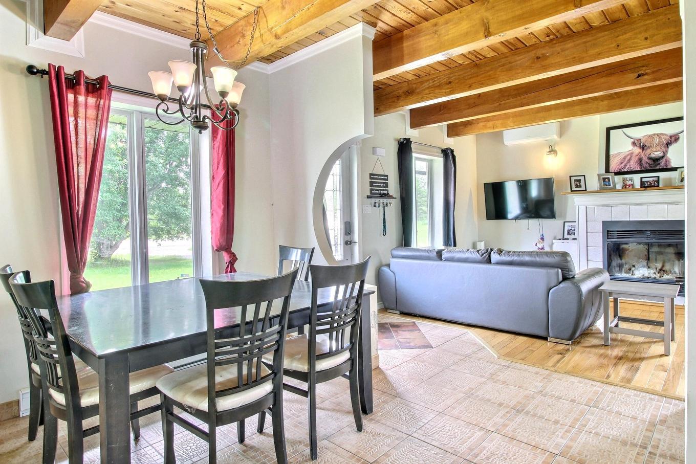 Dining room - 611 Route Des Pionniers, Rouyn-Noranda, QC - Indoor Photo Showing Dining Room With Fireplace