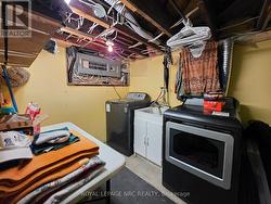 Lower Level Laundry Room /200 amp Breaker Panel -