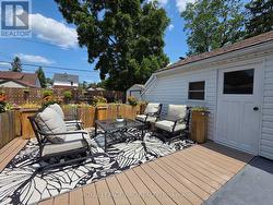 Outdoor Patio 15'4\" x 11'10\" off Single Car Garage -