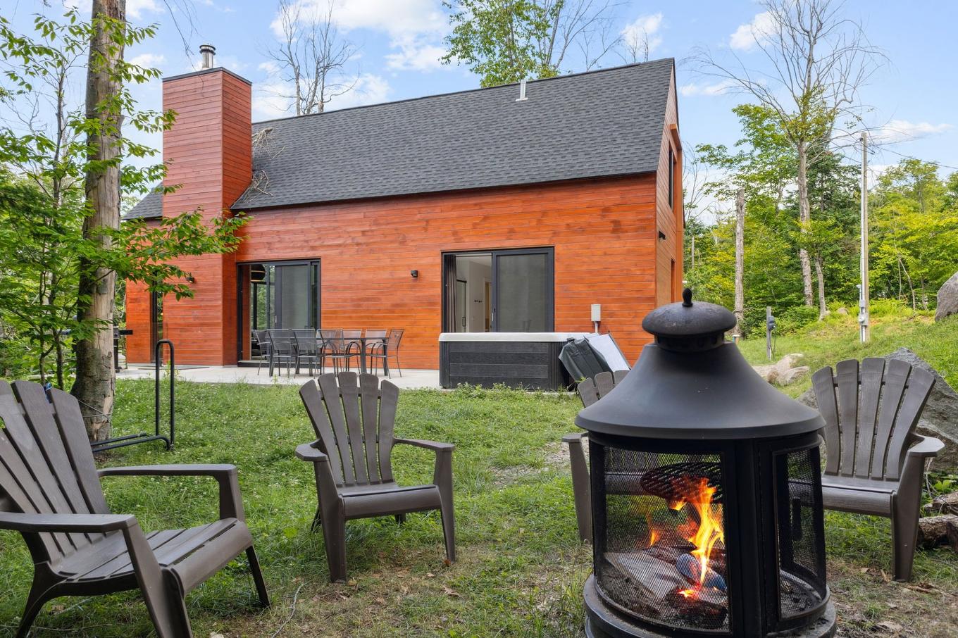 Back facade - 304 - 15 Imp. Du Cardinal, Lac-Supérieur, QC - Outdoor With Deck Patio Veranda With Exterior