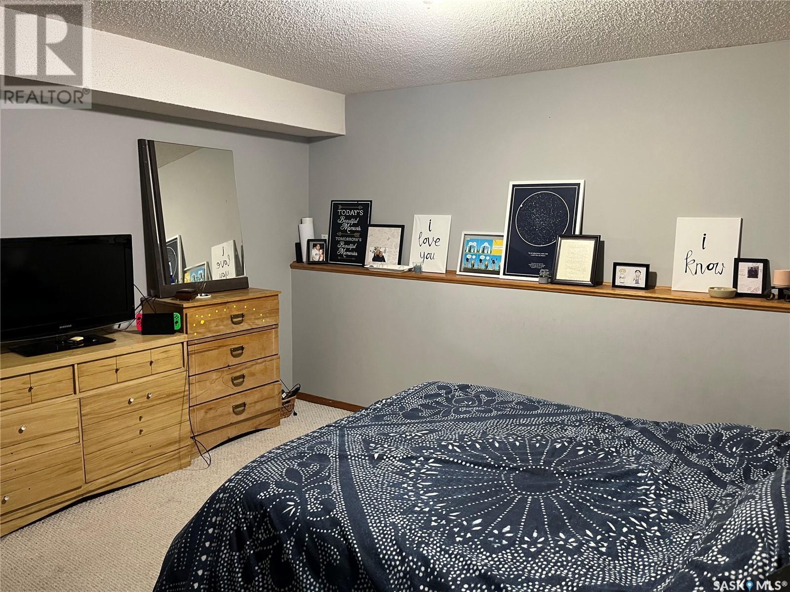 206 3Rd Avenue, Caronport, SK - Indoor Photo Showing Bedroom
