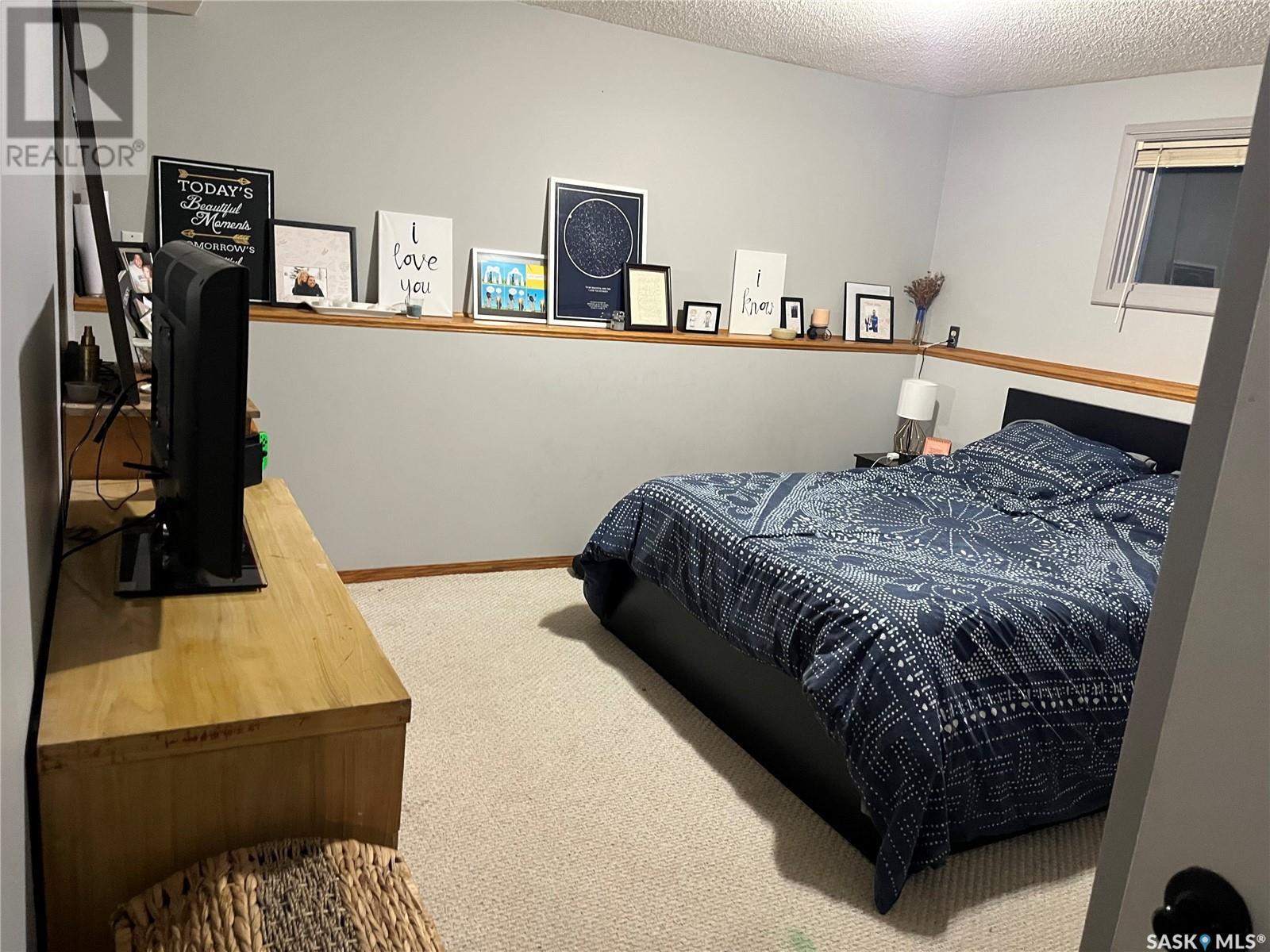 206 3Rd Avenue, Caronport, SK - Indoor Photo Showing Bedroom