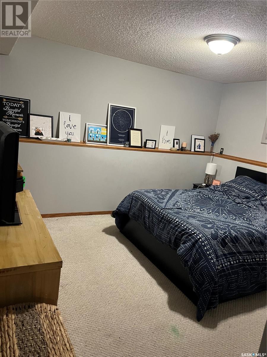 206 3Rd Avenue, Caronport, SK - Indoor Photo Showing Bedroom