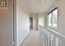 Hallway overlooks Foyer below -