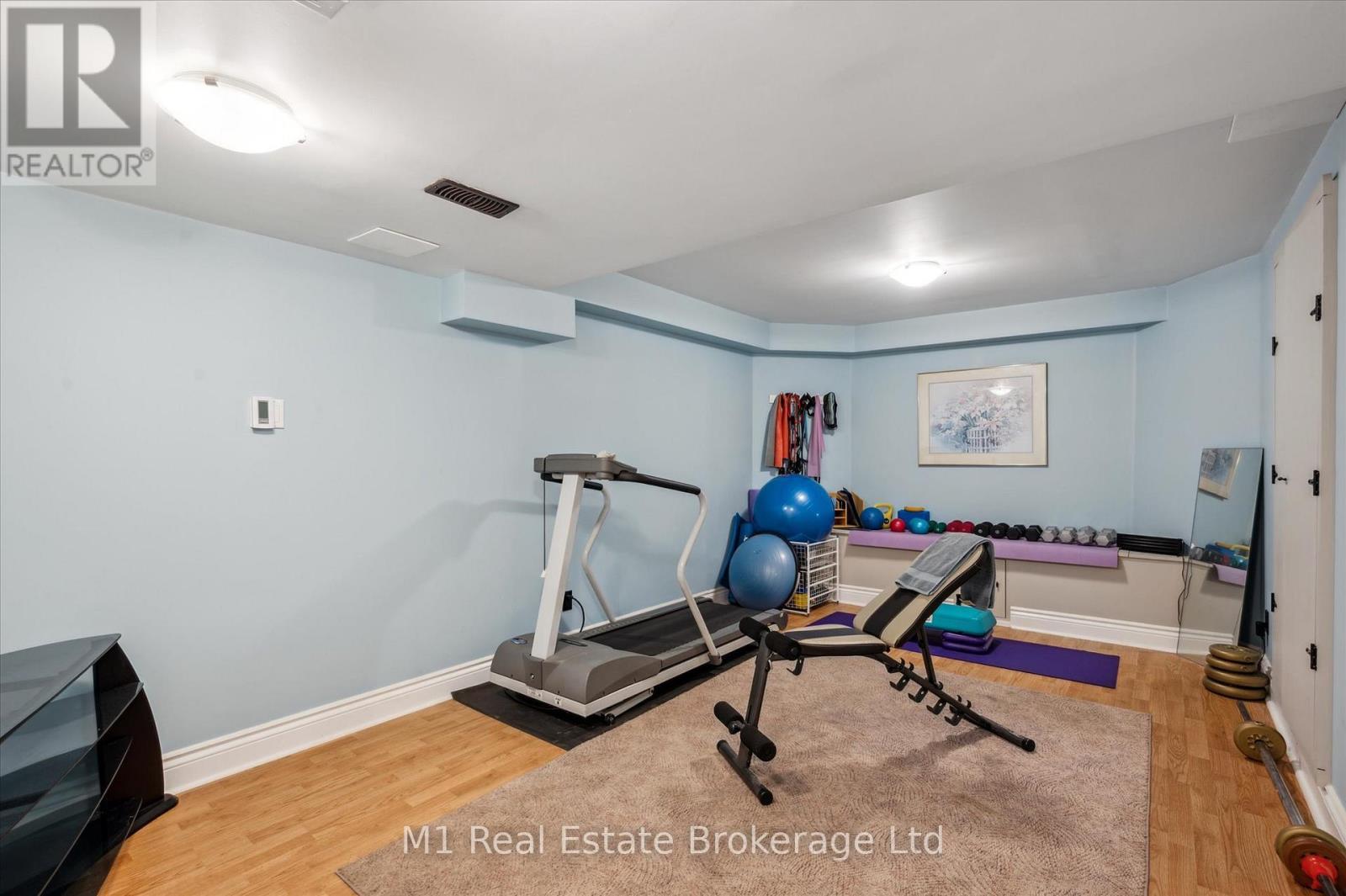 94 Aberfoyle Mill Crescent, Puslinch (Aberfoyle), ON - Indoor Photo Showing Gym Room