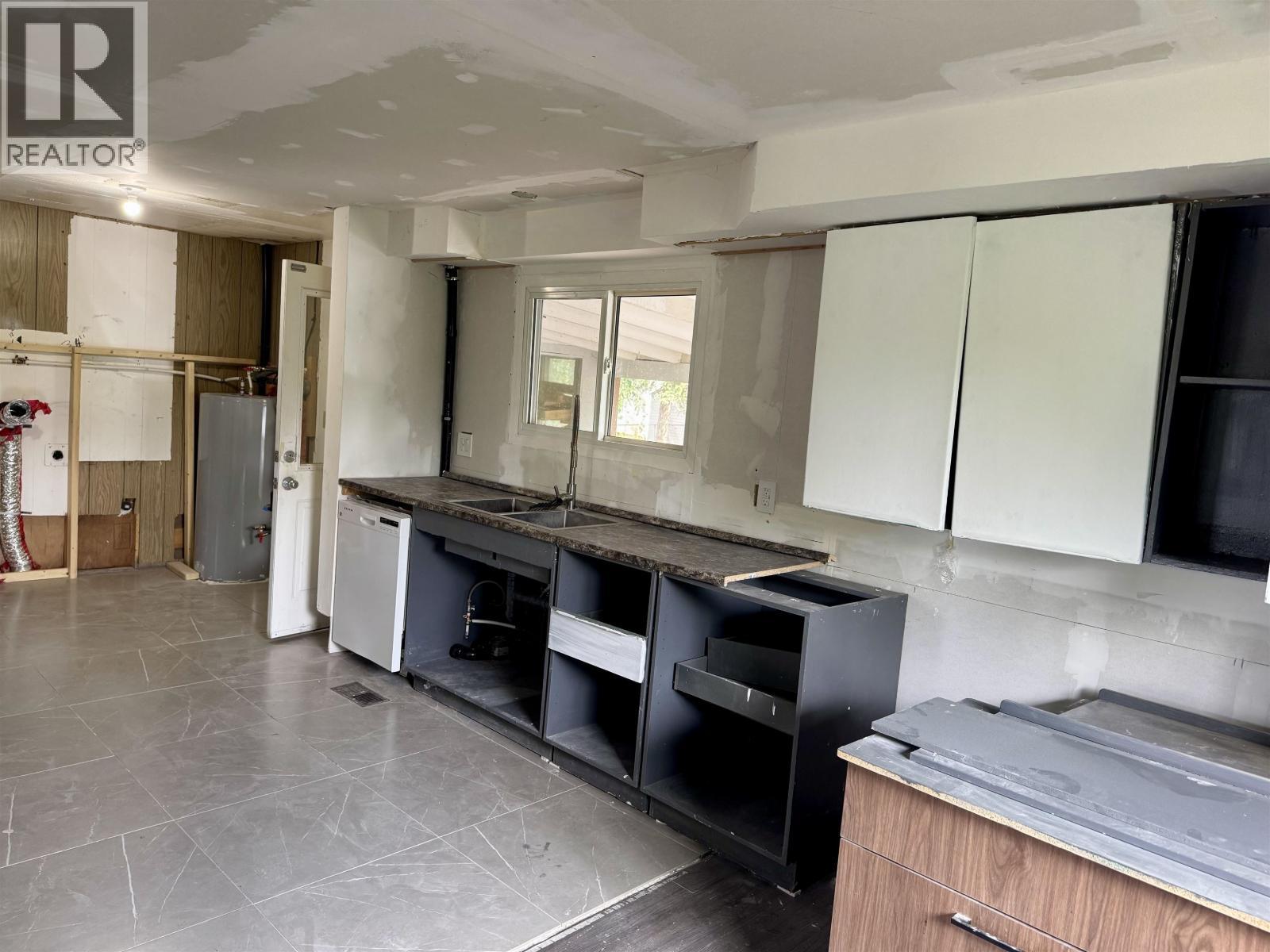 204 3Rd Avenue, Fort St. James, BC - Indoor Photo Showing Kitchen With Double Sink