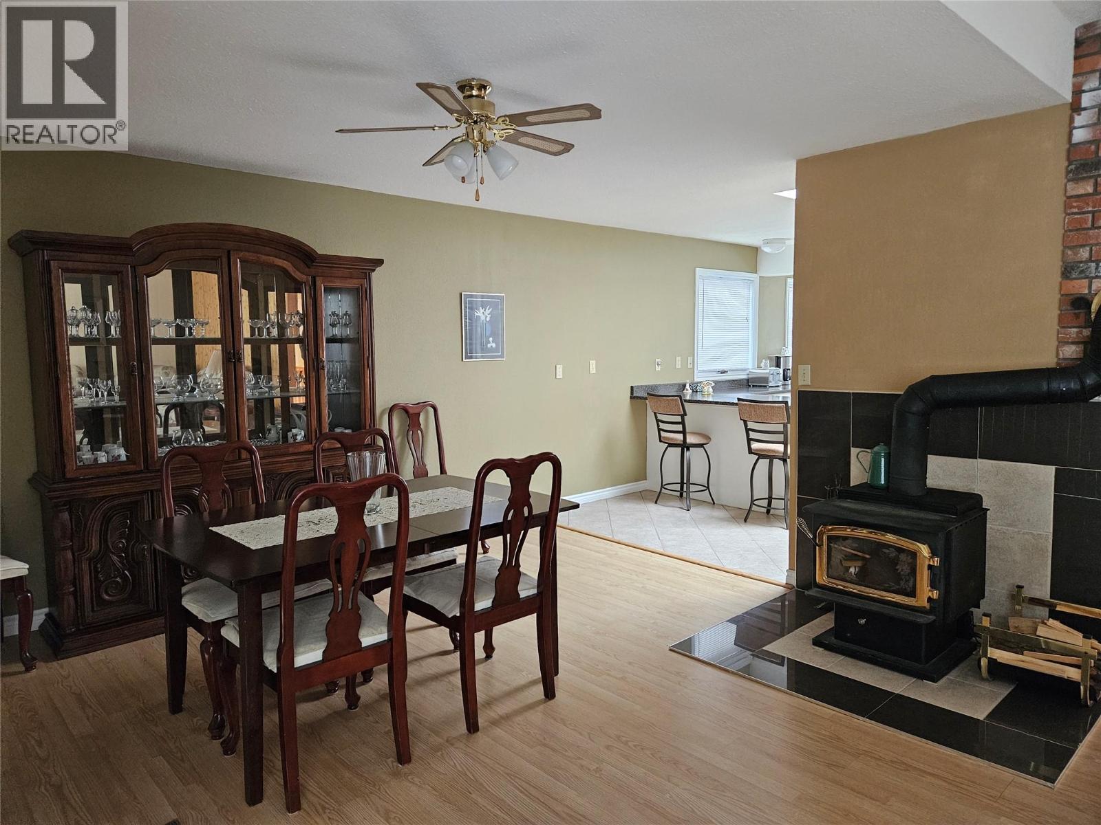145 Mostyn Road, Arrow Park, BC - Indoor Photo Showing Other Room With Fireplace