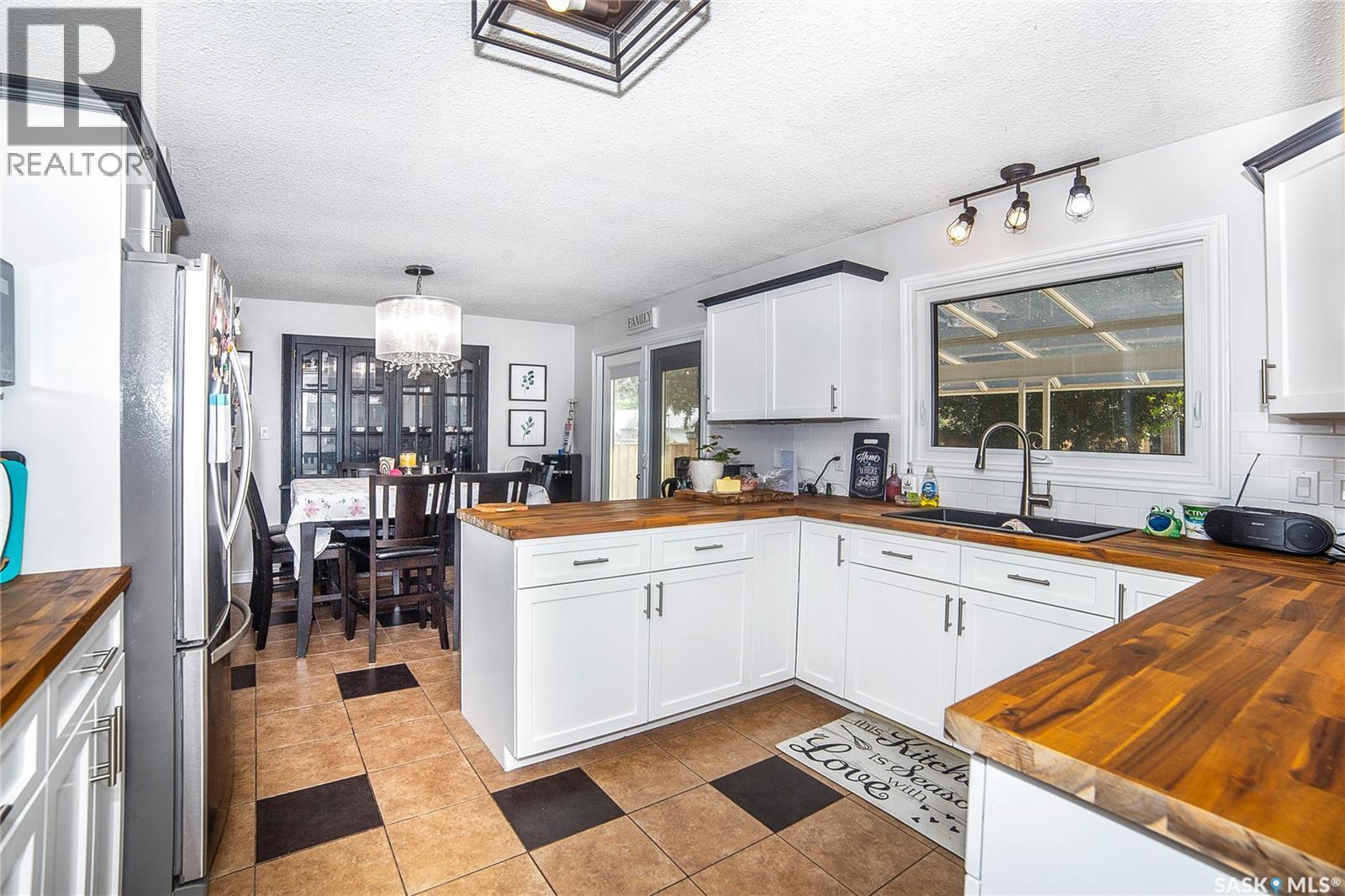 33 Birch Drive, Birch Hills, SK - Indoor Photo Showing Kitchen With Double Sink