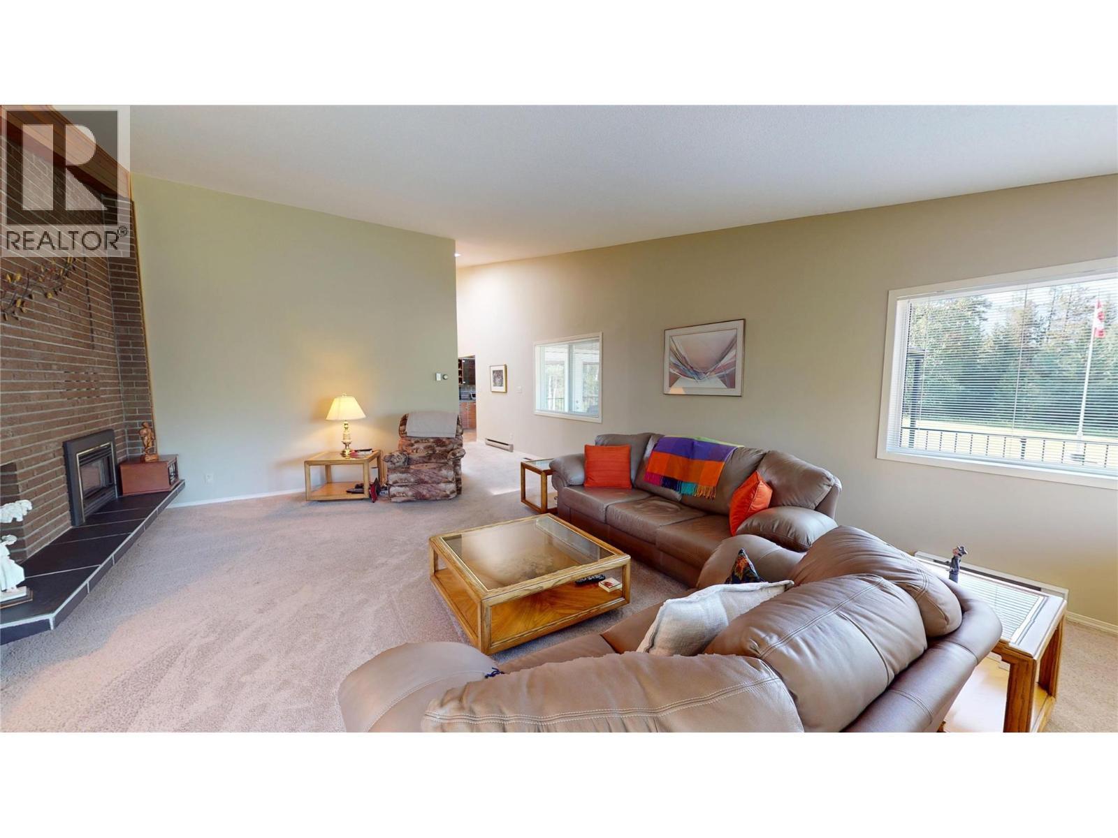 105 Castle Mountain Road, Fernie, BC - Indoor Photo Showing Living Room With Fireplace