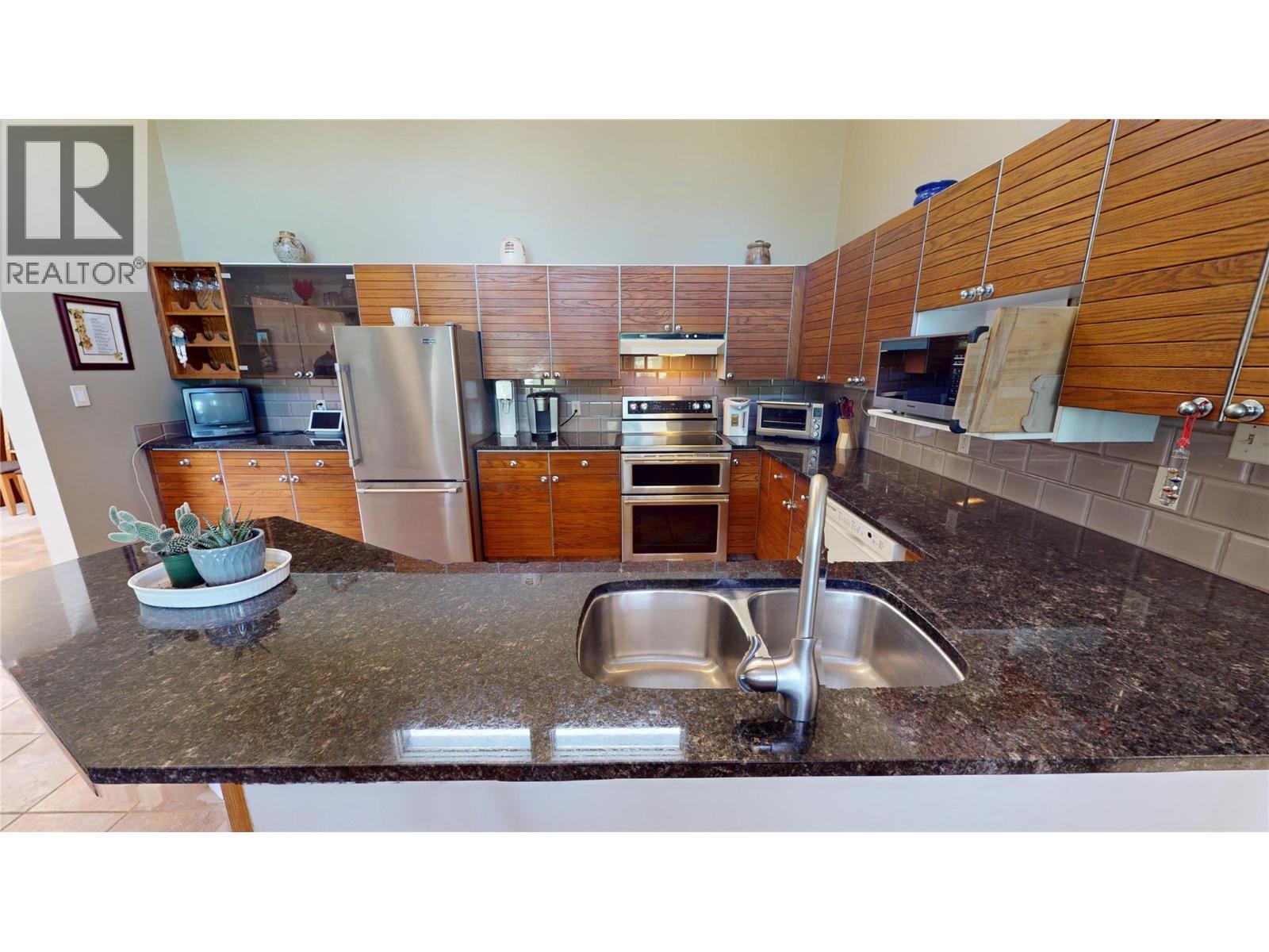 105 Castle Mountain Road, Fernie, BC - Indoor Photo Showing Kitchen With Double Sink
