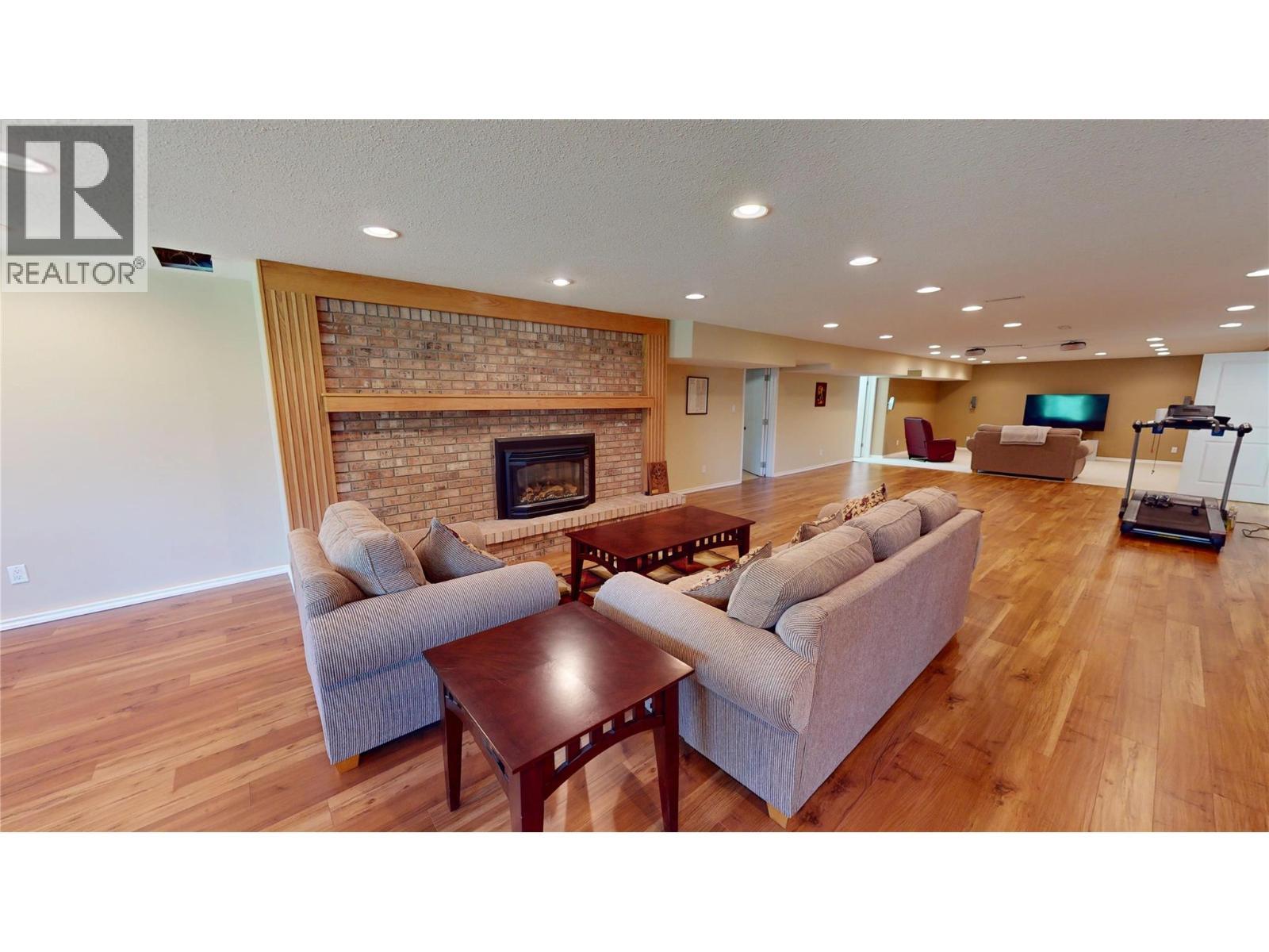105 Castle Mountain Road, Fernie, BC - Indoor Photo Showing Living Room With Fireplace