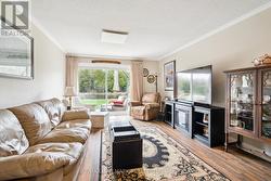 Steps out patio overlooks the water -