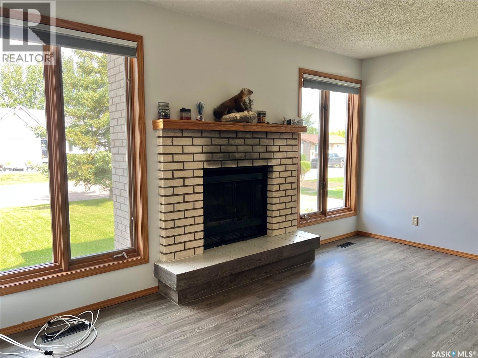 10 Birch Street, Porcupine Plain, SK - Indoor Photo Showing Living Room With Fireplace