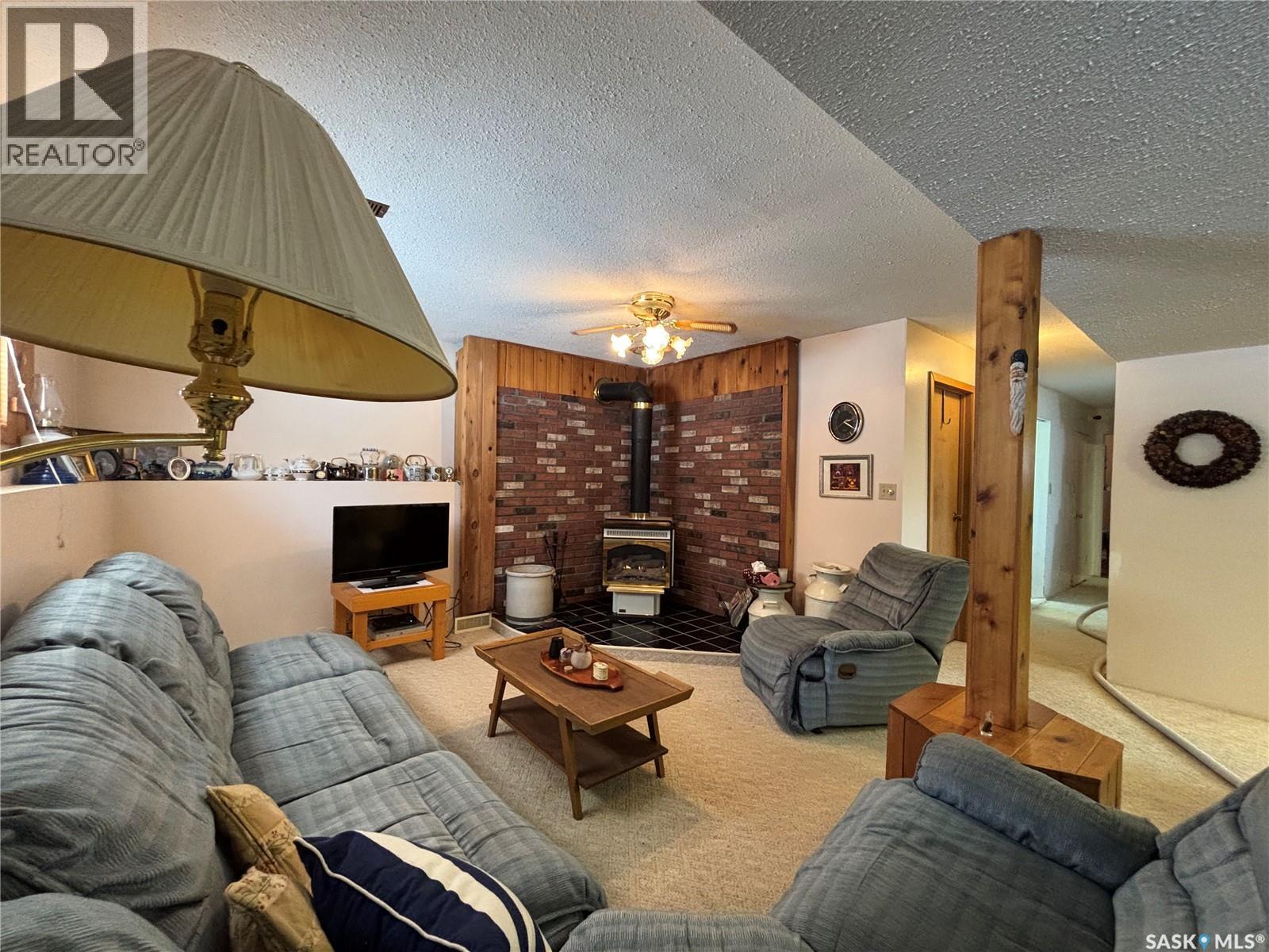 609 10Th Street N, Nipawin Rm No. 487, SK - Indoor Photo Showing Living Room With Fireplace