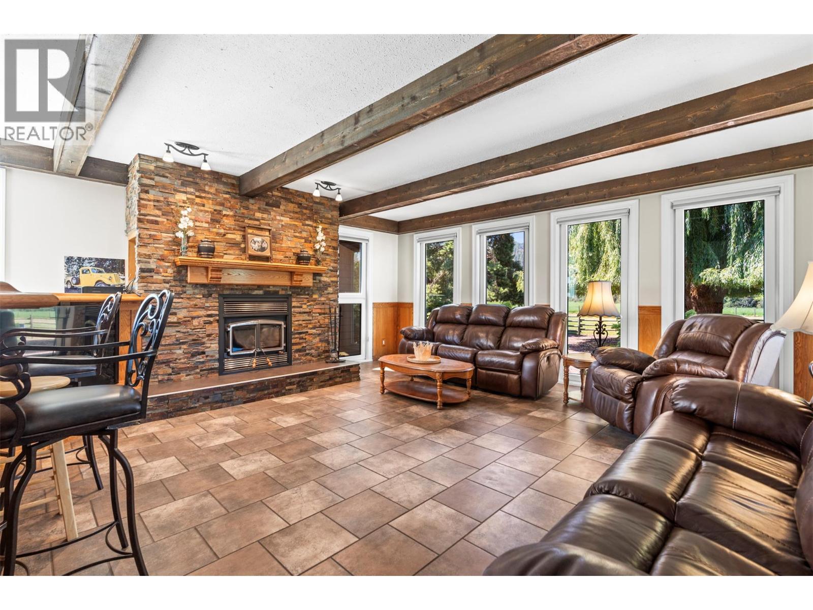 48 Waterside Road, Enderby, BC - Indoor Photo Showing Living Room With Fireplace