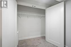 Large coat closet in finished lower landing -