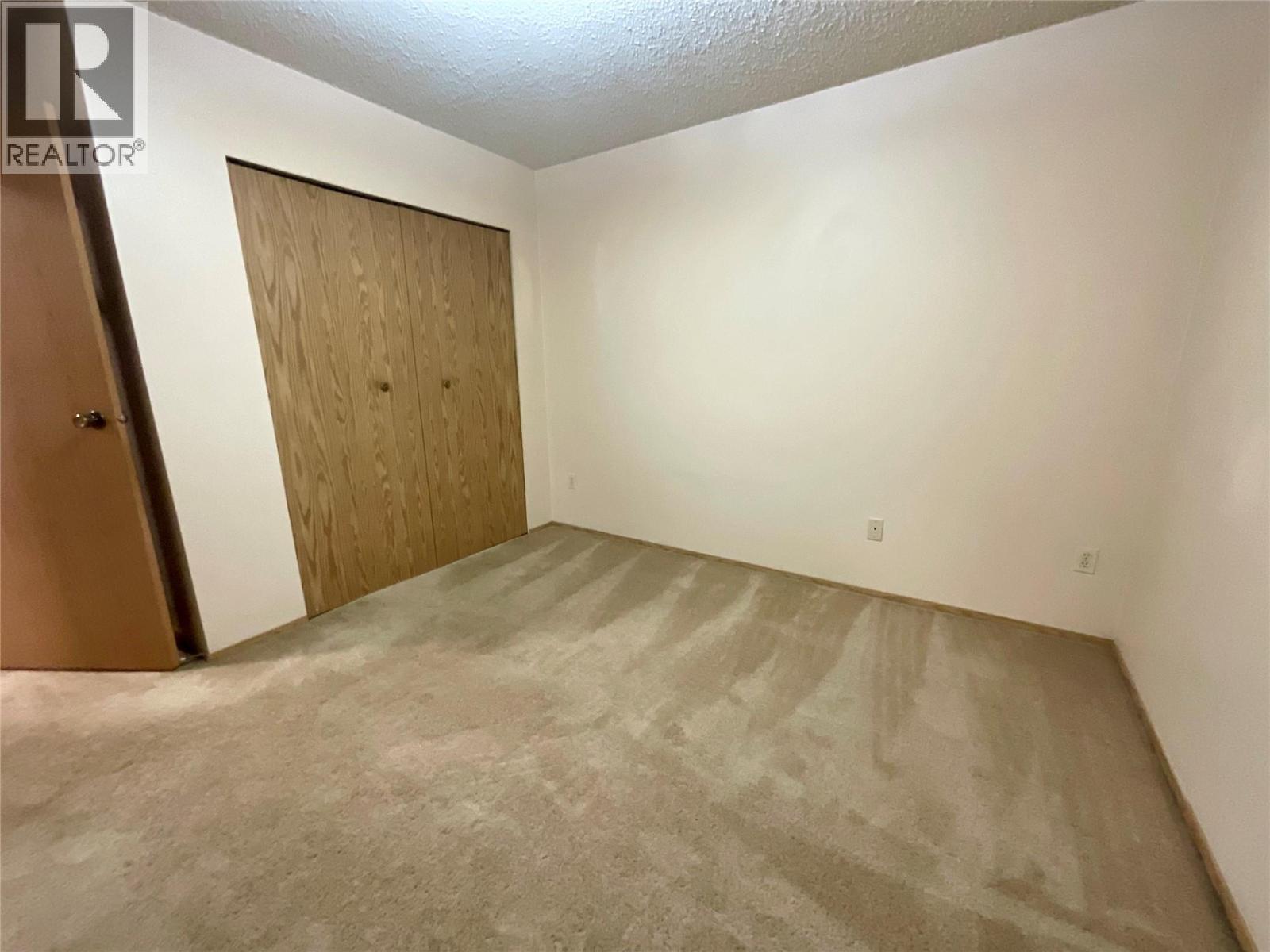 195 Chamberlain Crescent Unit# 113, Tumbler Ridge, BC - Indoor Photo Showing Other Room