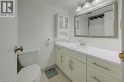 Bathroom featuring vanity and tile patterned floors -