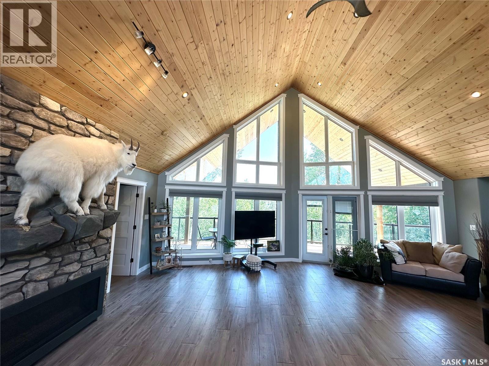 2 Derby Lane, Big Shell, SK - Indoor Photo Showing Living Room With Fireplace