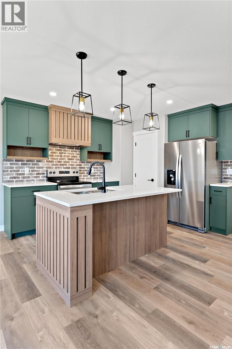 3080 Dumont Way, Regina, SK - Indoor Photo Showing Kitchen With Stainless Steel Kitchen With Upgraded Kitchen