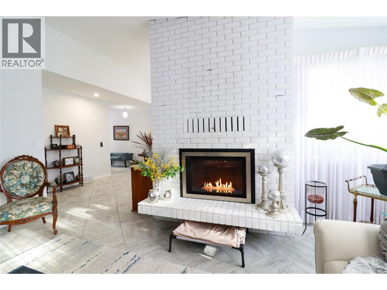 103 Eagle Drive, Kaleden, BC - Indoor Photo Showing Living Room With Fireplace