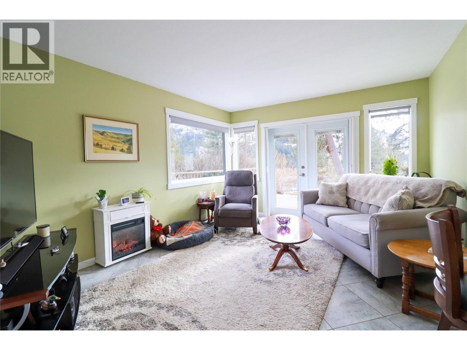 103 Eagle Drive, Kaleden, BC - Indoor Photo Showing Living Room With Fireplace