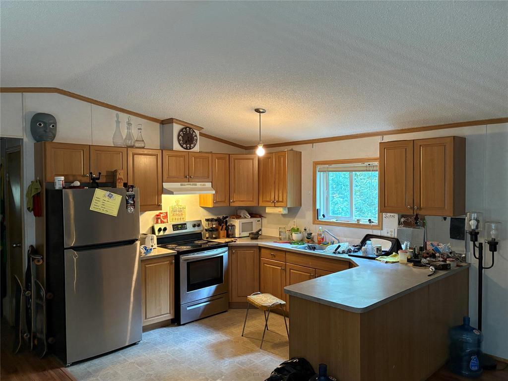 89 Mcdonald Drive, Strathclair, MB - Indoor Photo Showing Kitchen
