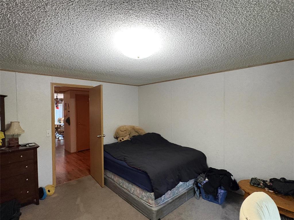 89 Mcdonald Drive, Strathclair, MB - Indoor Photo Showing Bedroom