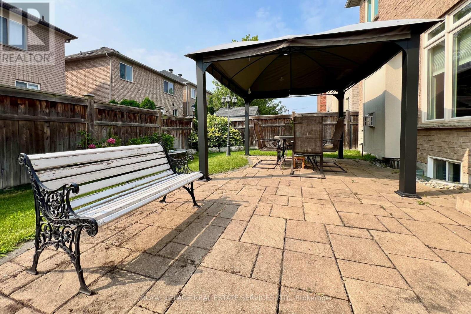 Fully-Fenced Backyard with Stone Patio & Gazebo - 4681 Webb Street, Burlington, ON - Outdoor With Deck Patio Veranda With Exterior