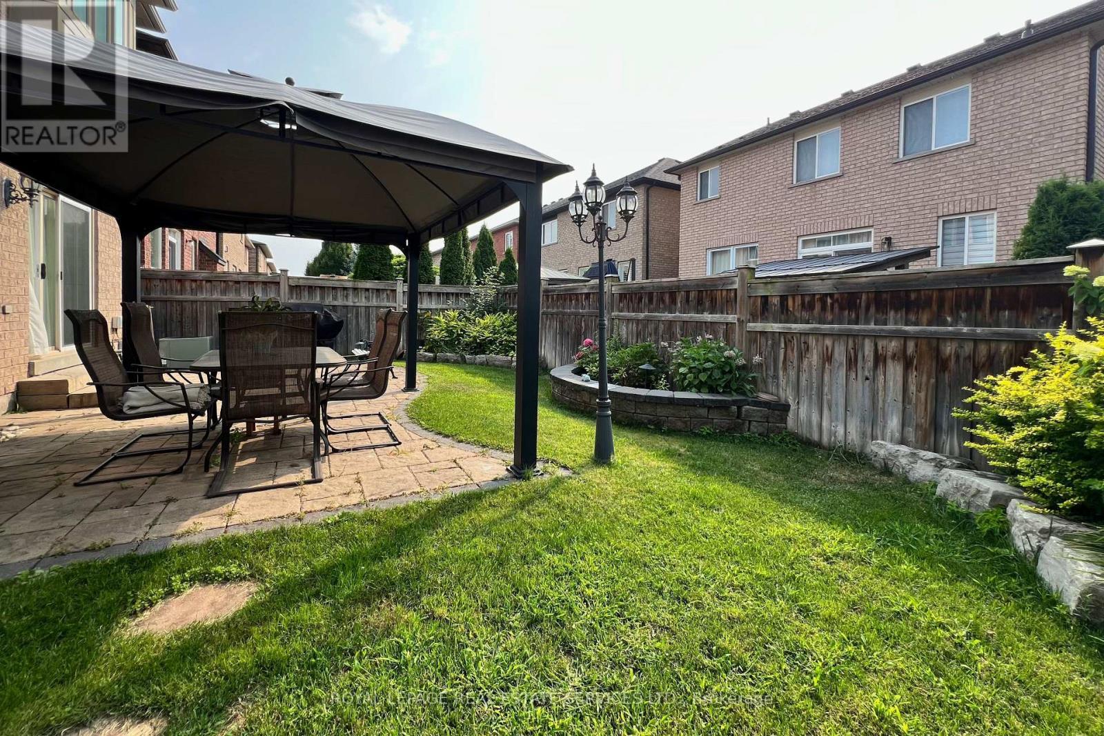 Fully-Fenced Backyard with Stone Patio & Gazebo - 4681 Webb Street, Burlington, ON - Outdoor With Deck Patio Veranda With Exterior