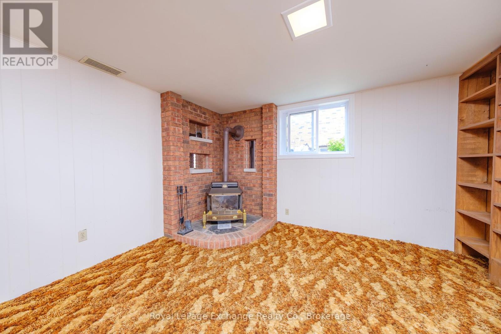 426 Elgin Street, Huron-Kinloss (Lucknow), ON - Indoor Photo Showing Other Room With Fireplace