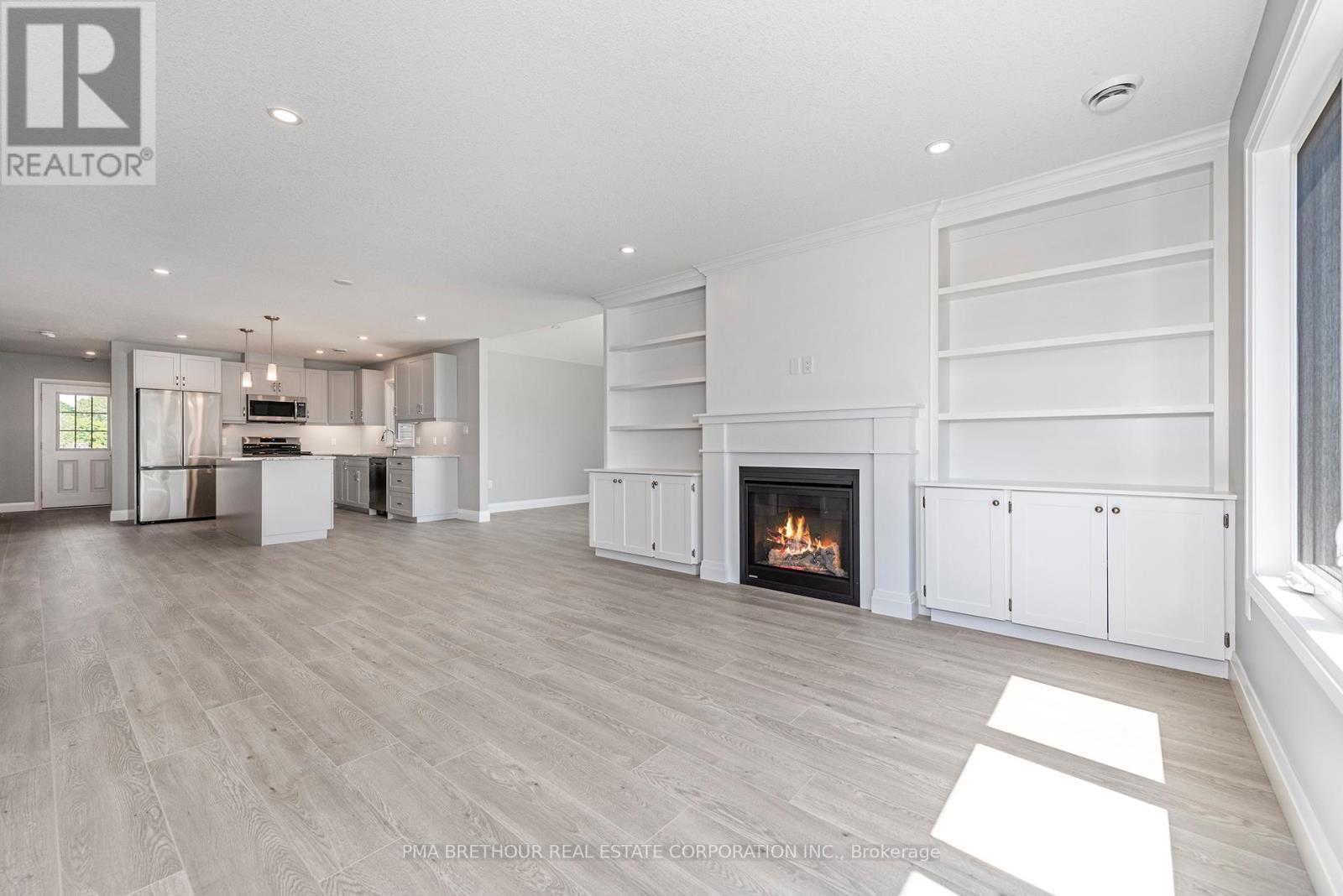 269 Lake Breeze Drive, Ashfield-Colborne-Wawanosh, ON - Indoor Photo Showing Living Room With Fireplace