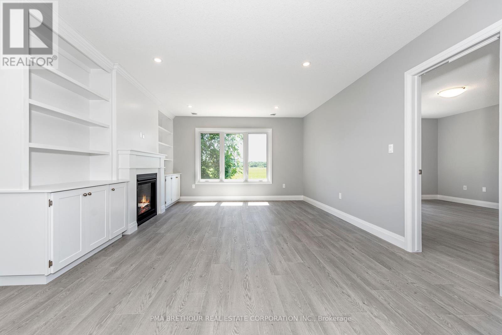 269 Lake Breeze Drive, Ashfield-Colborne-Wawanosh, ON - Indoor With Fireplace