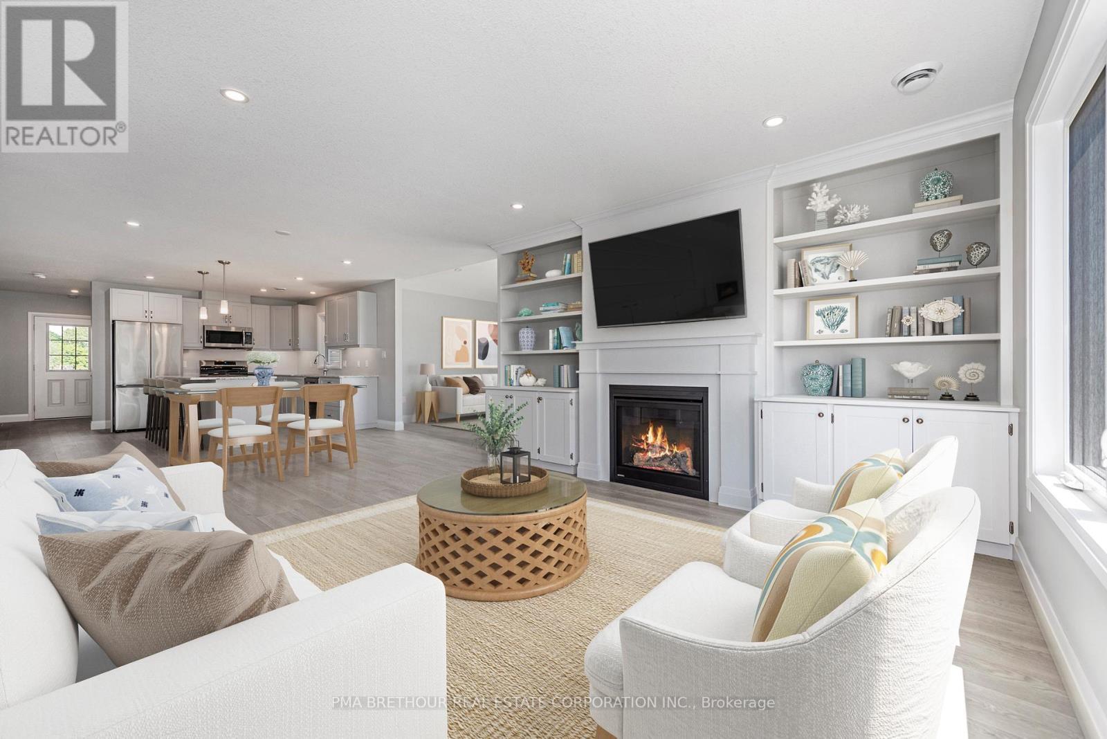 VIRTUALLY STAGED - 269 Lake Breeze Drive, Ashfield-Colborne-Wawanosh, ON - Indoor Photo Showing Living Room With Fireplace