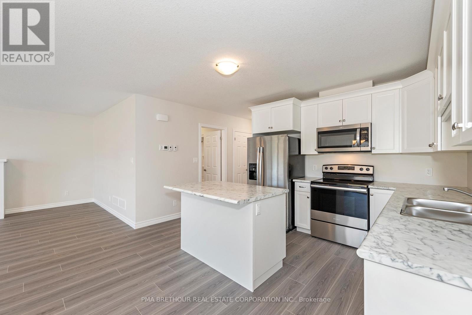 8 Sweet Water Drive, Ashfield-Colborne-Wawanosh, ON - Indoor Photo Showing Kitchen With Stainless Steel Kitchen With Double Sink