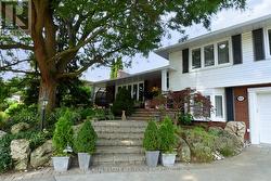 Home featuring beautifully landscaped front garden -