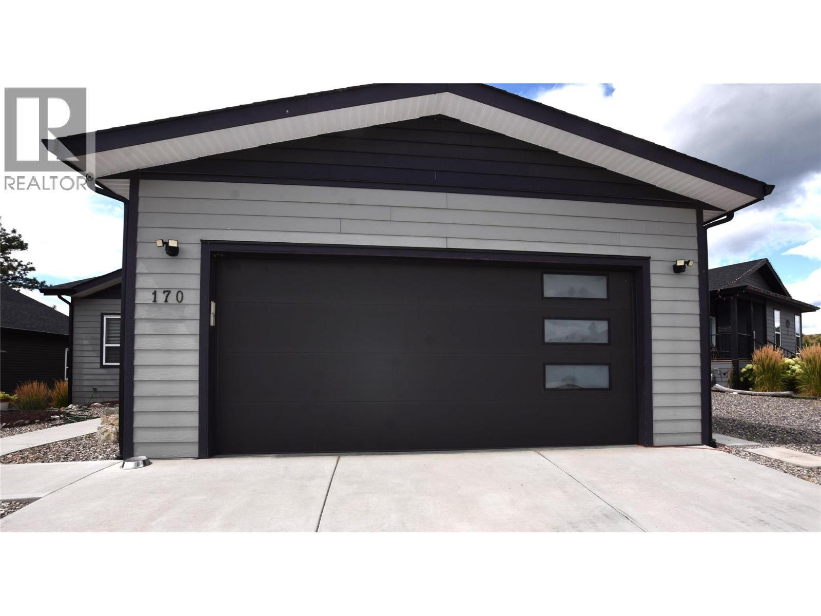 attached double garage - 9510 Highway 97N Unit# 170, Vernon, BC