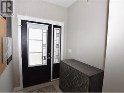 inside the front door -