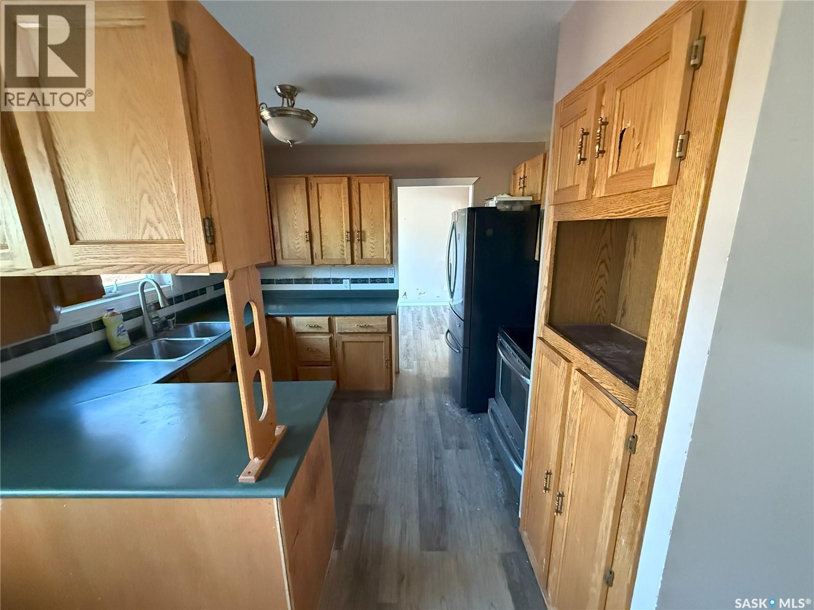 3116 Grey Owl Crescent, Prince Albert, SK - Indoor Photo Showing Kitchen With Double Sink