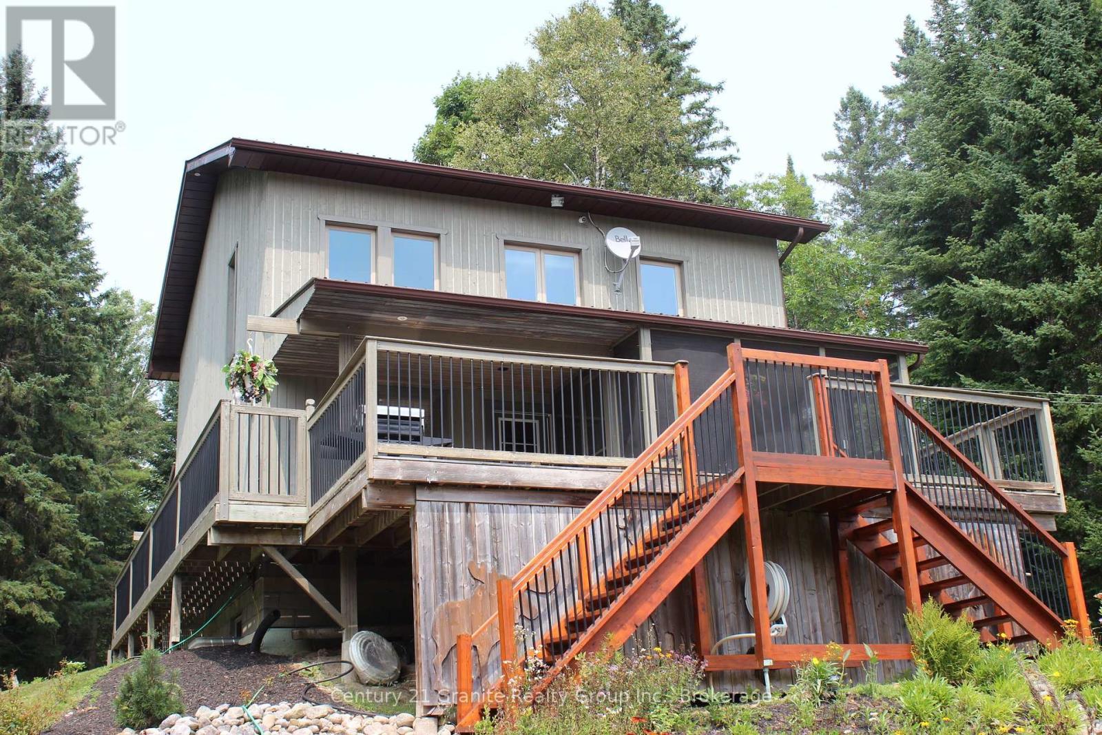 1082 Green Lake Road, Algonquin Highlands (Stanhope), ON - Outdoor With Deck Patio Veranda With Exterior