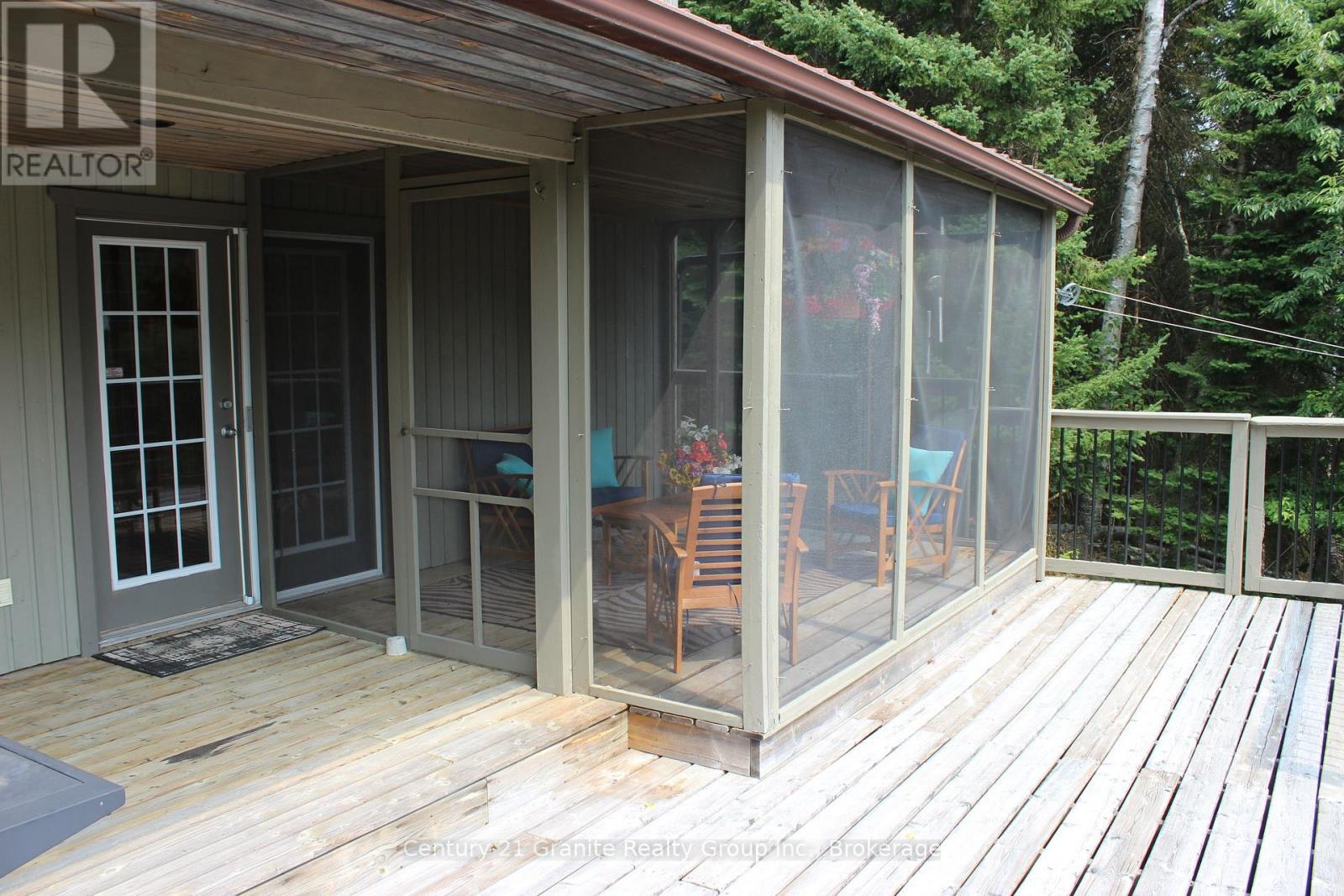 Screened Deck - 1082 Green Lake Road, Algonquin Highlands (Stanhope), ON - Outdoor With Deck Patio Veranda With Exterior